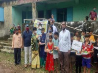 Foodgrain distribution at Anandwadi families